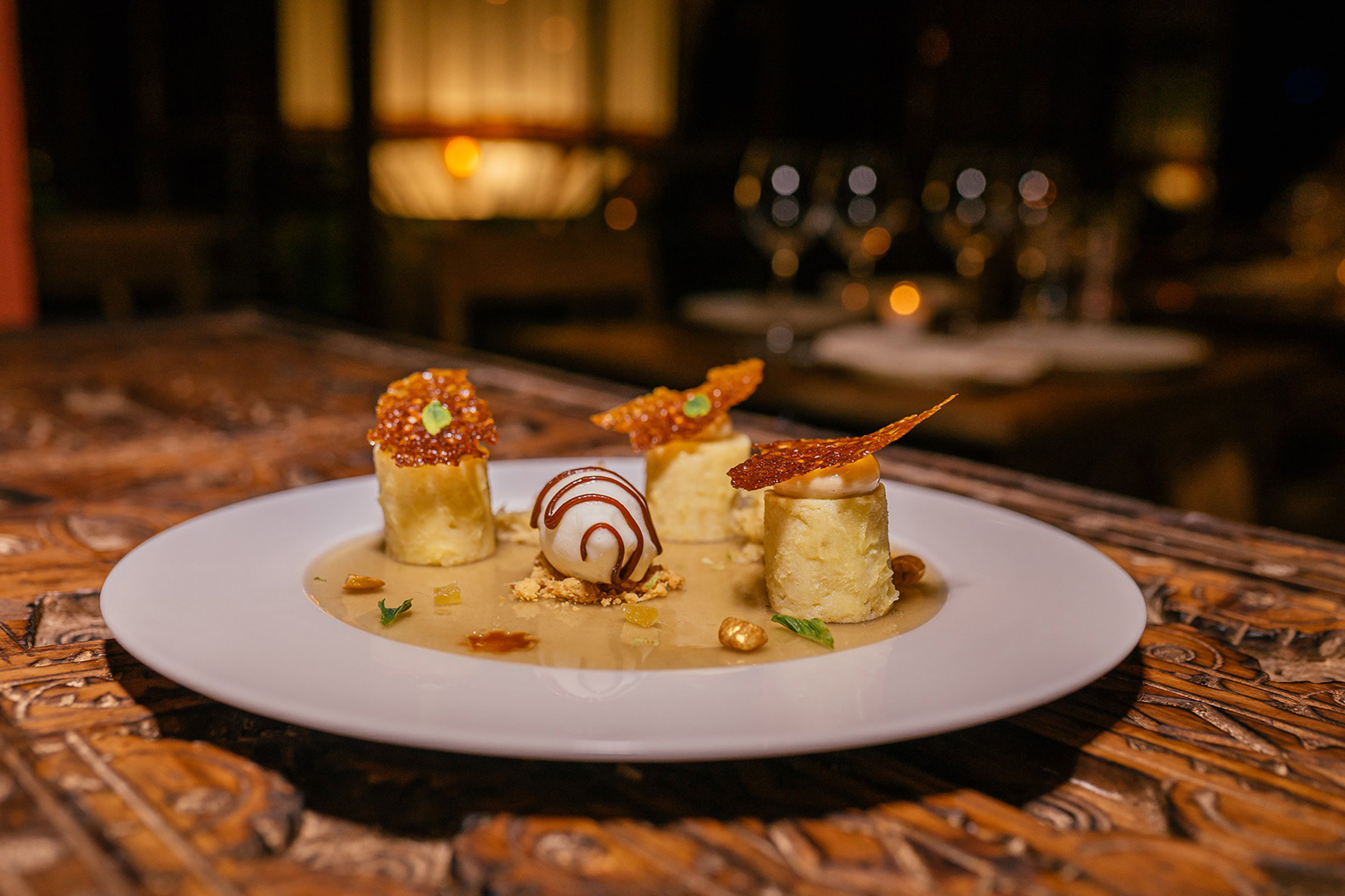 Tabouleh, hummus, lamb and couscous find their place along the locally sourced ingredients, such as fresh lobster and tender beef, in the kitchen, creating an exotic experience and the best way to explore traditional Moroccan cuisine at its very best. - Secondary Image