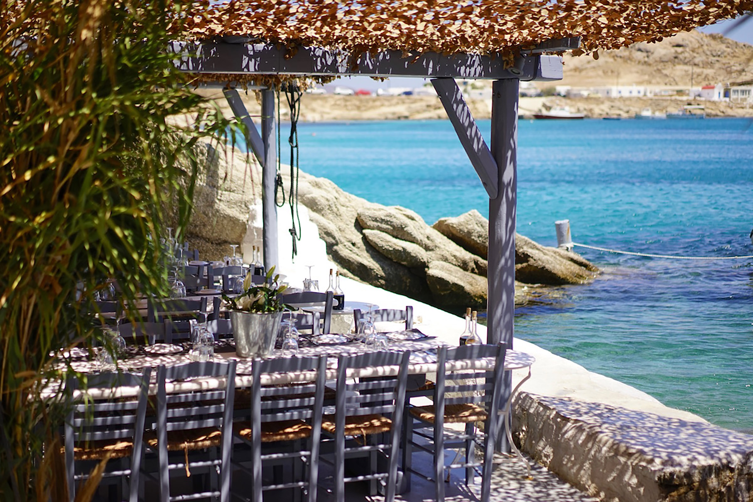 “Spilia” means “cave” in Greek, and surely one could not come up with a more appropriate name for this unique restaurant and cocktail bar nestled in a natural cave, sculpted by the water and the winds through the centuries. - Secondary Image