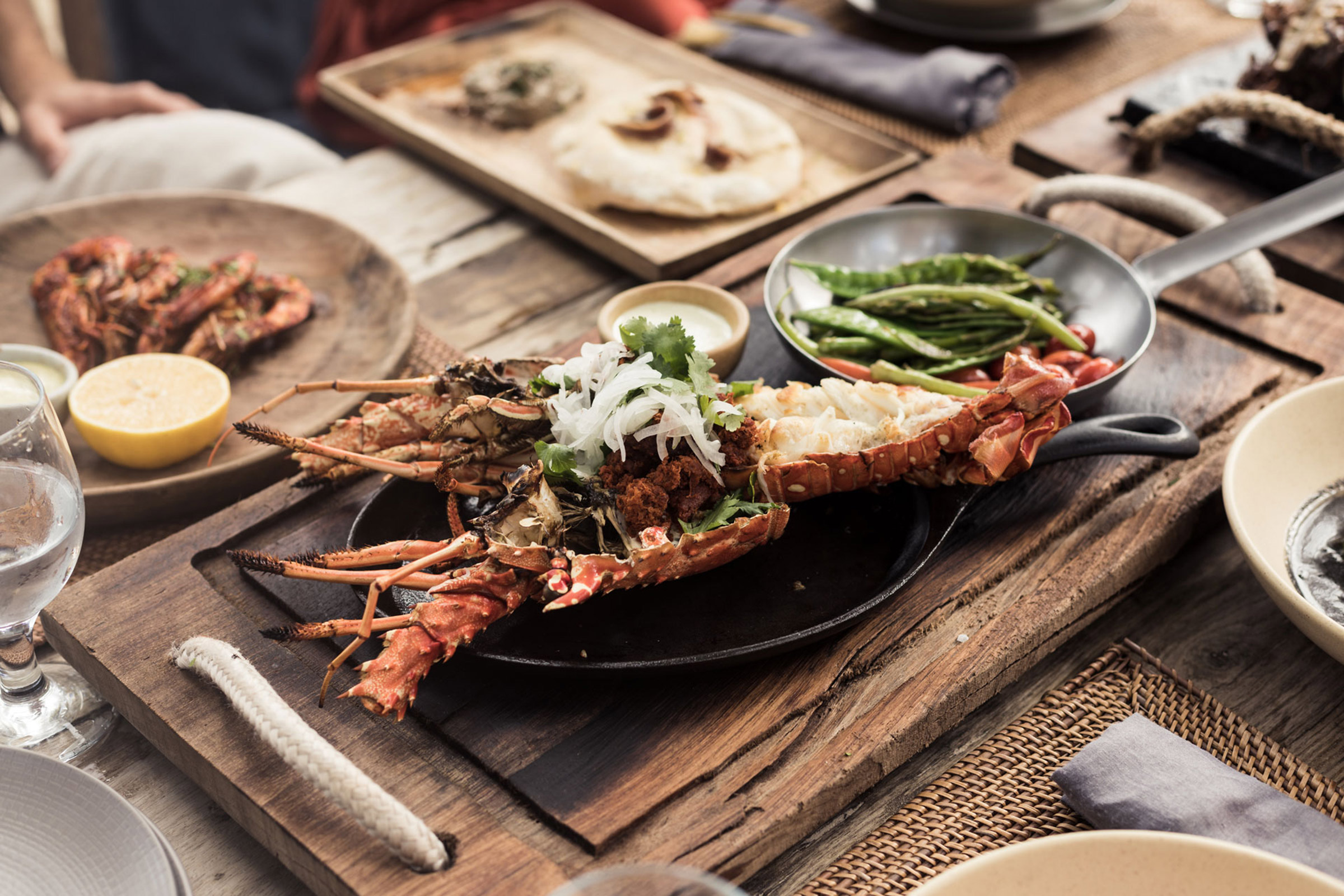 Its menu, created by the unique treasures of the land and the sea, showcases light dishes based on locally harvested ingredients, coming from local fishermen who make sure to bring only their best catches to meet the high criteria of the kitchen. - Secondary Image
