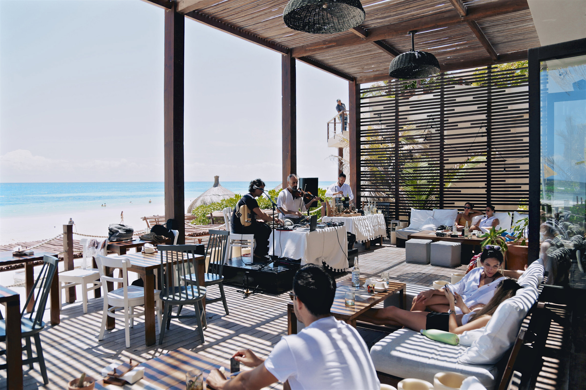 Comfy sofas, positive energy, cool design, great ocean view and tasty food make up one of the best healthy-eating joints in Tulum. Here you will be served plant-focused, 100% gluten, grain and dairy free dishes, that are as yummy as they are instagrammable. - Secondary Image