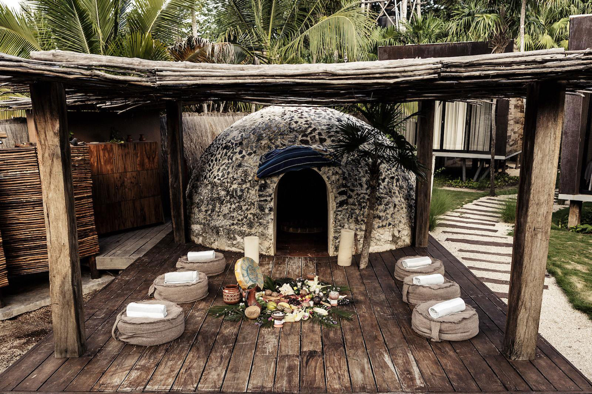 Traditional indigenous treatments, energy healing, deep muscle relaxation techniques, herbal and flower baths prepared in our custom made copper tubs are just some of the therapies you will experience by the finest professionals from Mexico and around the world. - Secondary Image