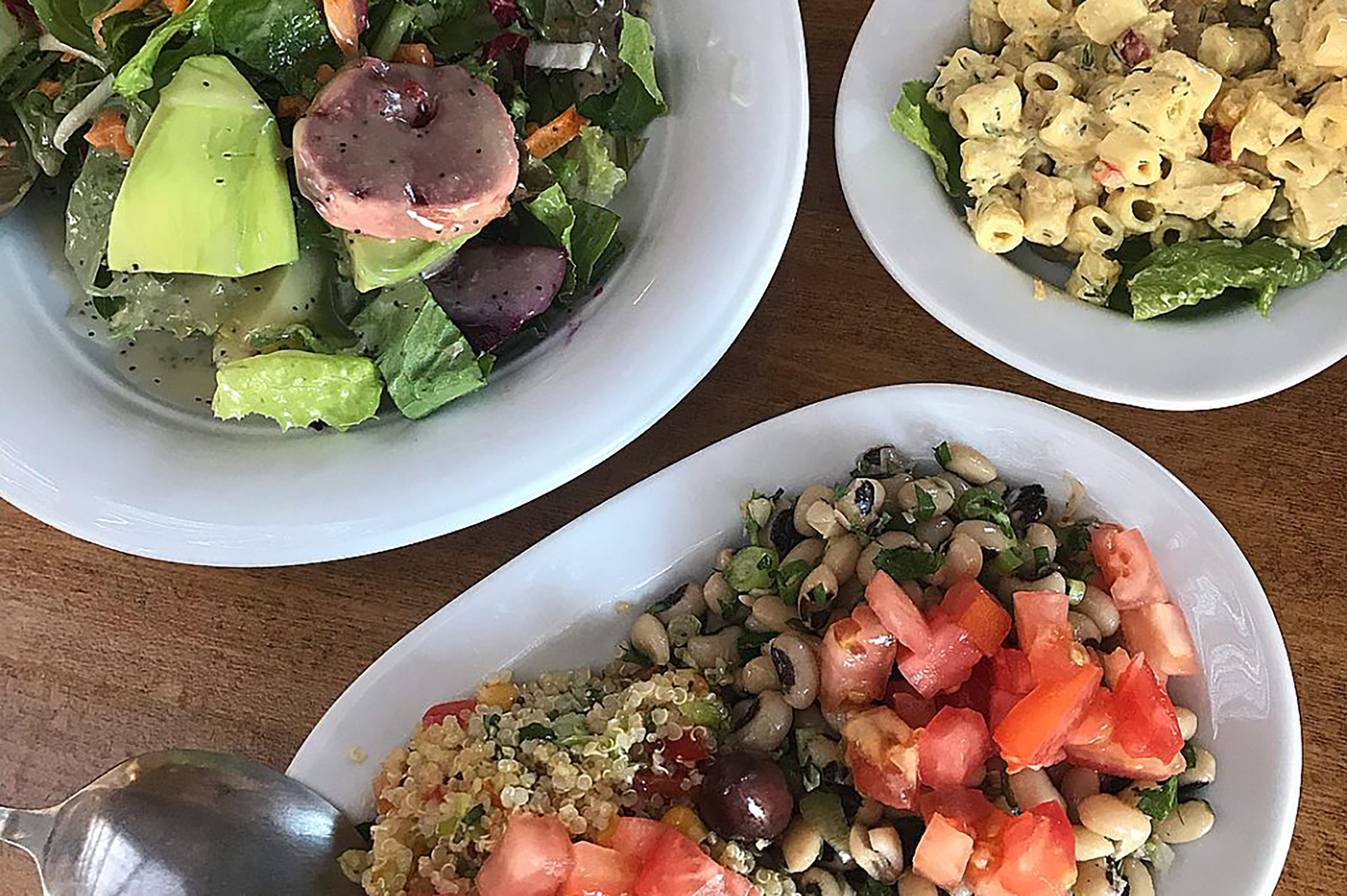 You will find amazing Greek dishes and inspired fresh salads at the one and only -literally as it is the only one here- Fokos Tavern, which is ideal for a delicious after-swimming feast. - Secondary Image