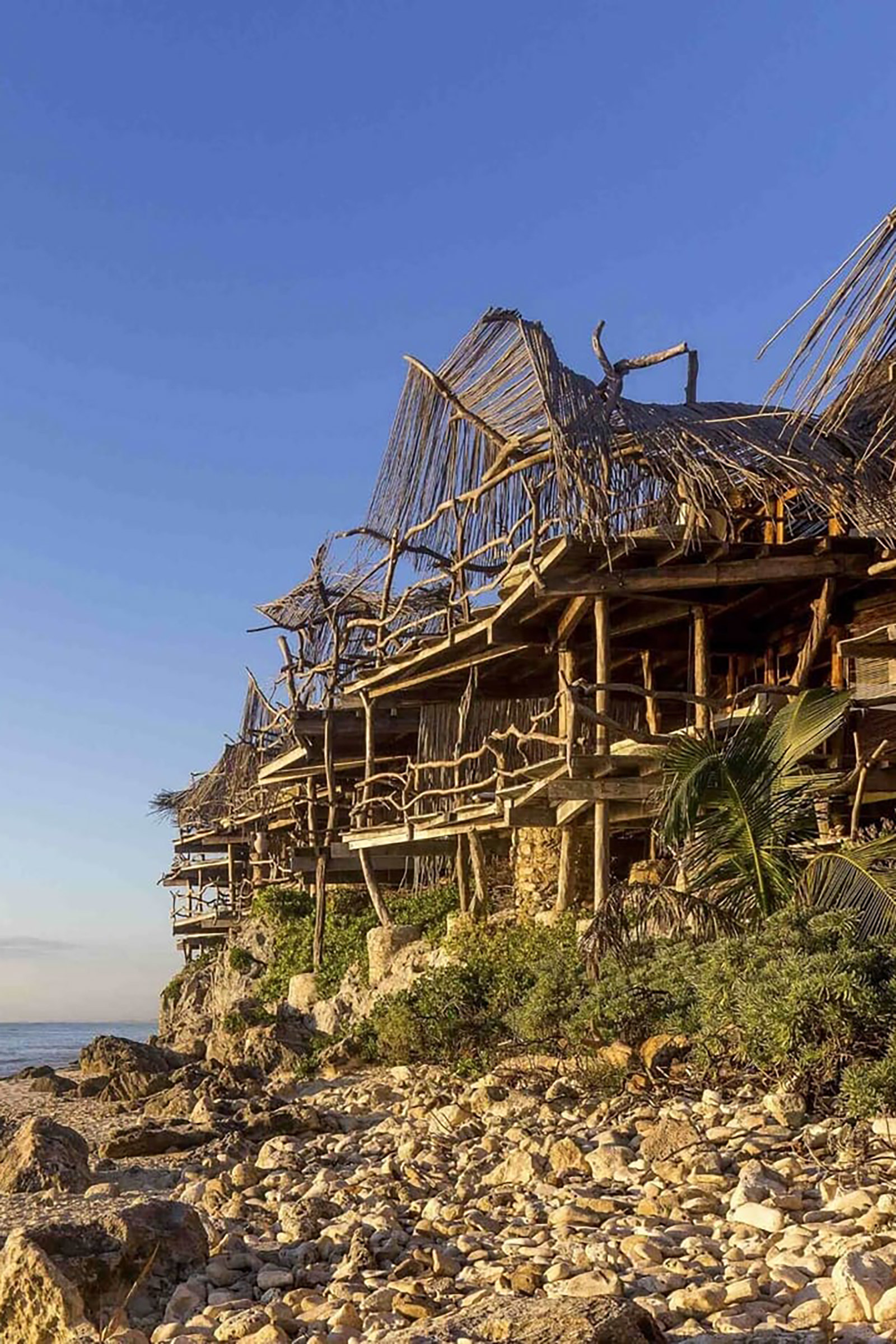 Azulik Tulum is an oceanfront jungle resort which takes sustainability and reconnecting with nature to a whole new level, as its stunning collection of natural wooden villas features no air-conditioning, television, or electrical light, in order to minimise environmental impact and help guests return to the embrace of mother nature in the most luxurious of ways - Image