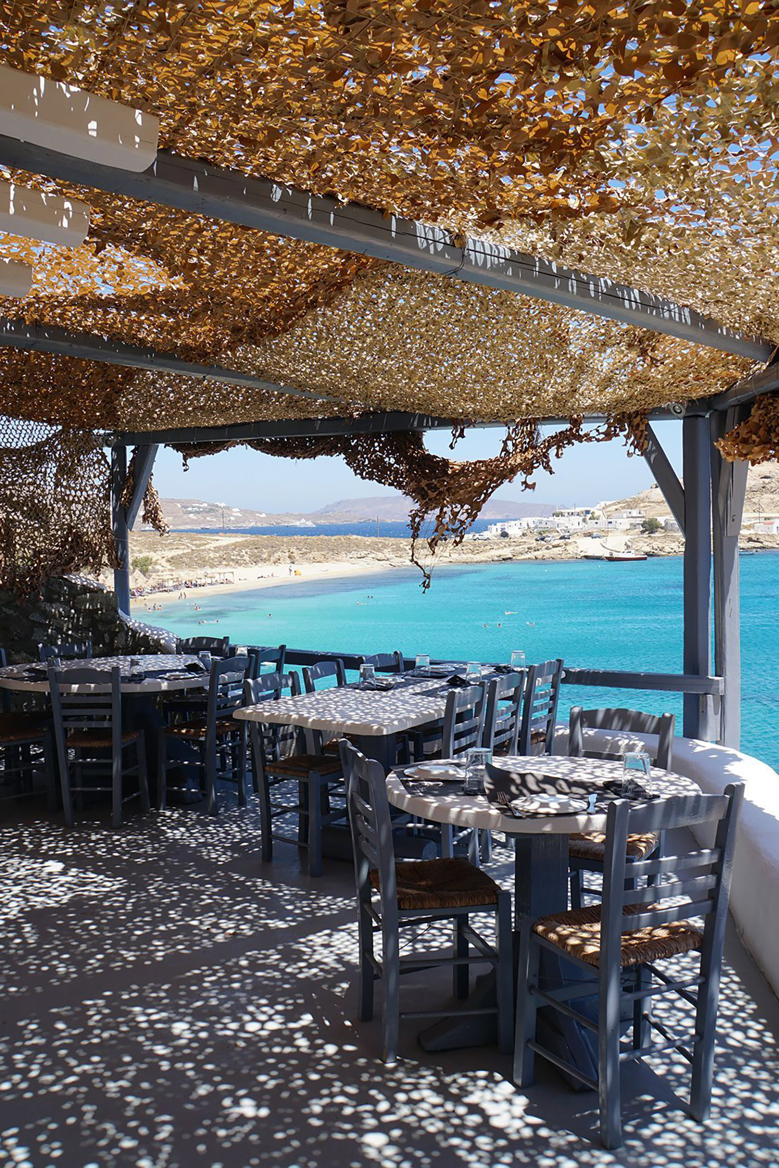 “Spilia” means “cave” in Greek, and surely one could not come up with a more appropriate name for this unique restaurant and cocktail bar nestled in a natural cave, sculpted by the water and the winds through the centuries. - Image