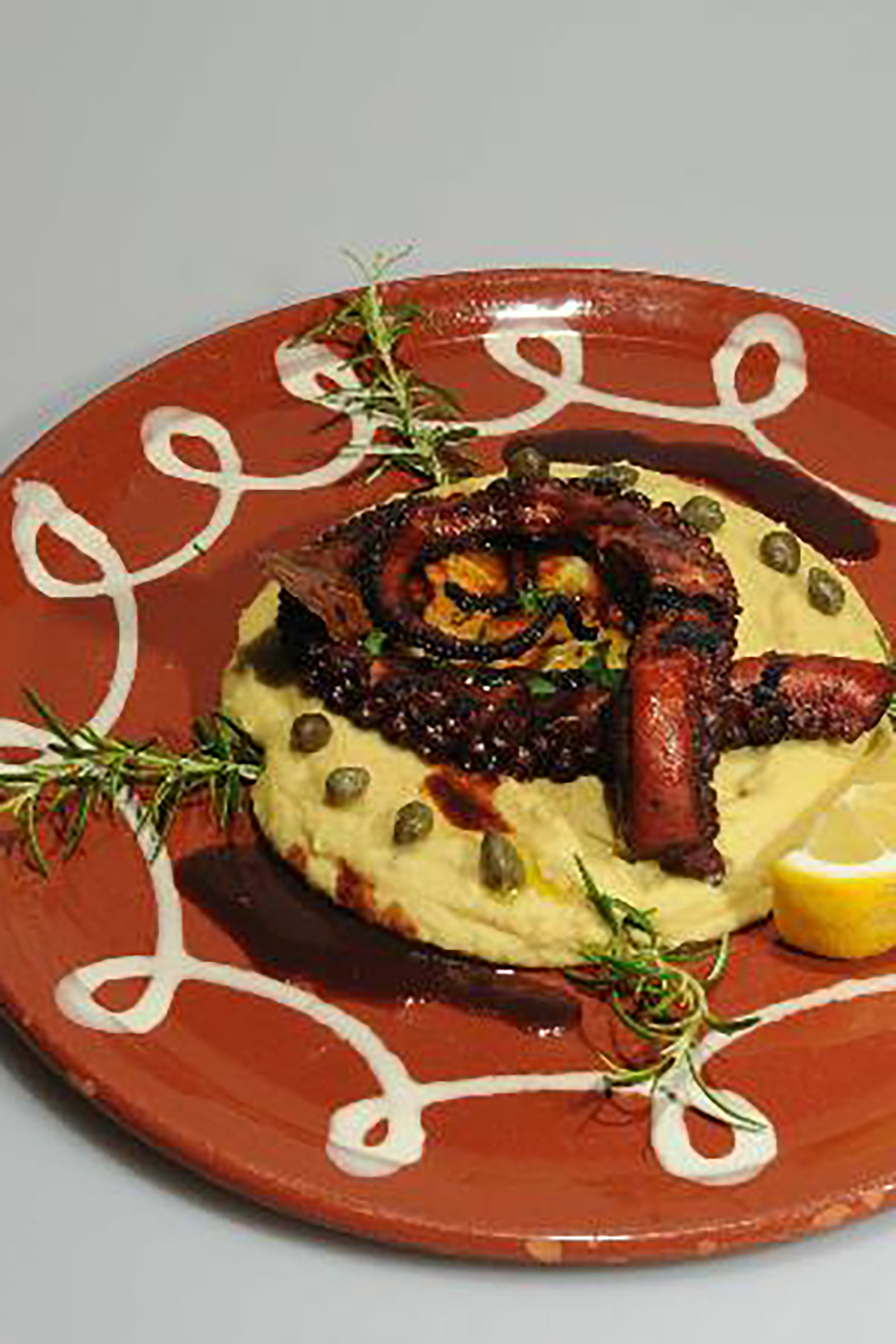 The salads are an important part of the menu, as many of them can serve as a delicious main course, while the burritos and the tostadas are perfectly mixed with the amazing margaritas and sangrias coming straight from the lively bar. - Image