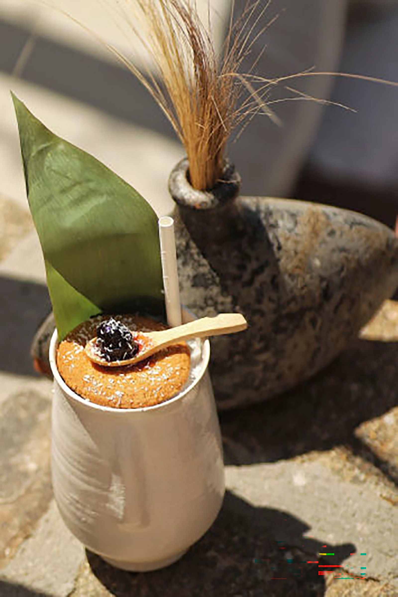 Relax on the designer chaise longues, facing the endless blue sea and the neighbouring islands, take a pick from the sophisticated classics or the tailor-made cocktails prepared in perfection with the finest spirits, freshest fruits and local herbs, treat yourself to an octopus carpaccio with avocado mousse or a black angus burger and surrender to the magical evening turning into night on one of the most beautiful islands in the world. - Image