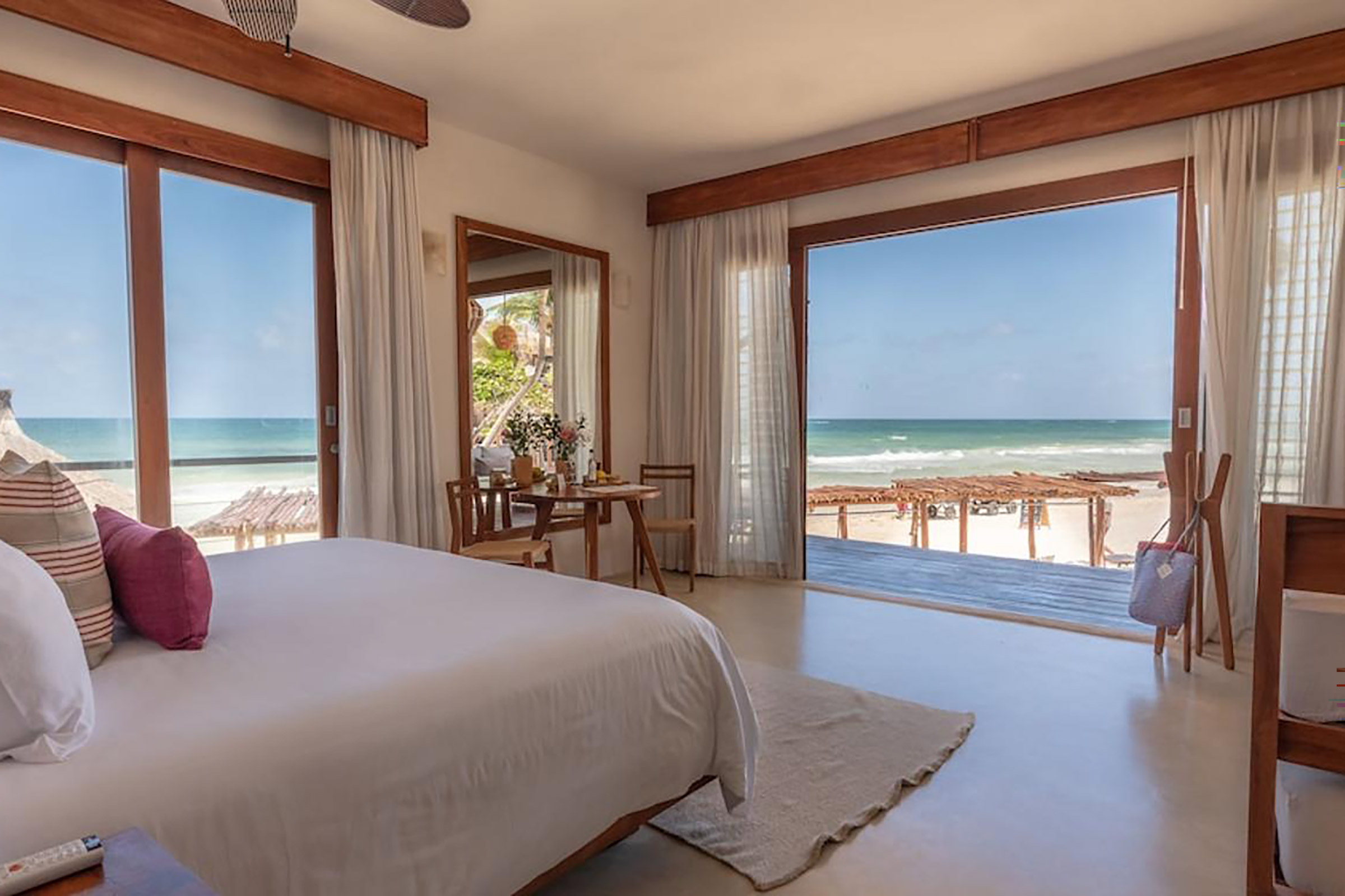 All rooms and suites are just a stone’s throw away from the crystal-clear waters of the Caribbean, featuring a Mexican-chic style of decoration, serene colours and relaxing vibes, spacious terraces and patios and beautiful views. - Secondary Image