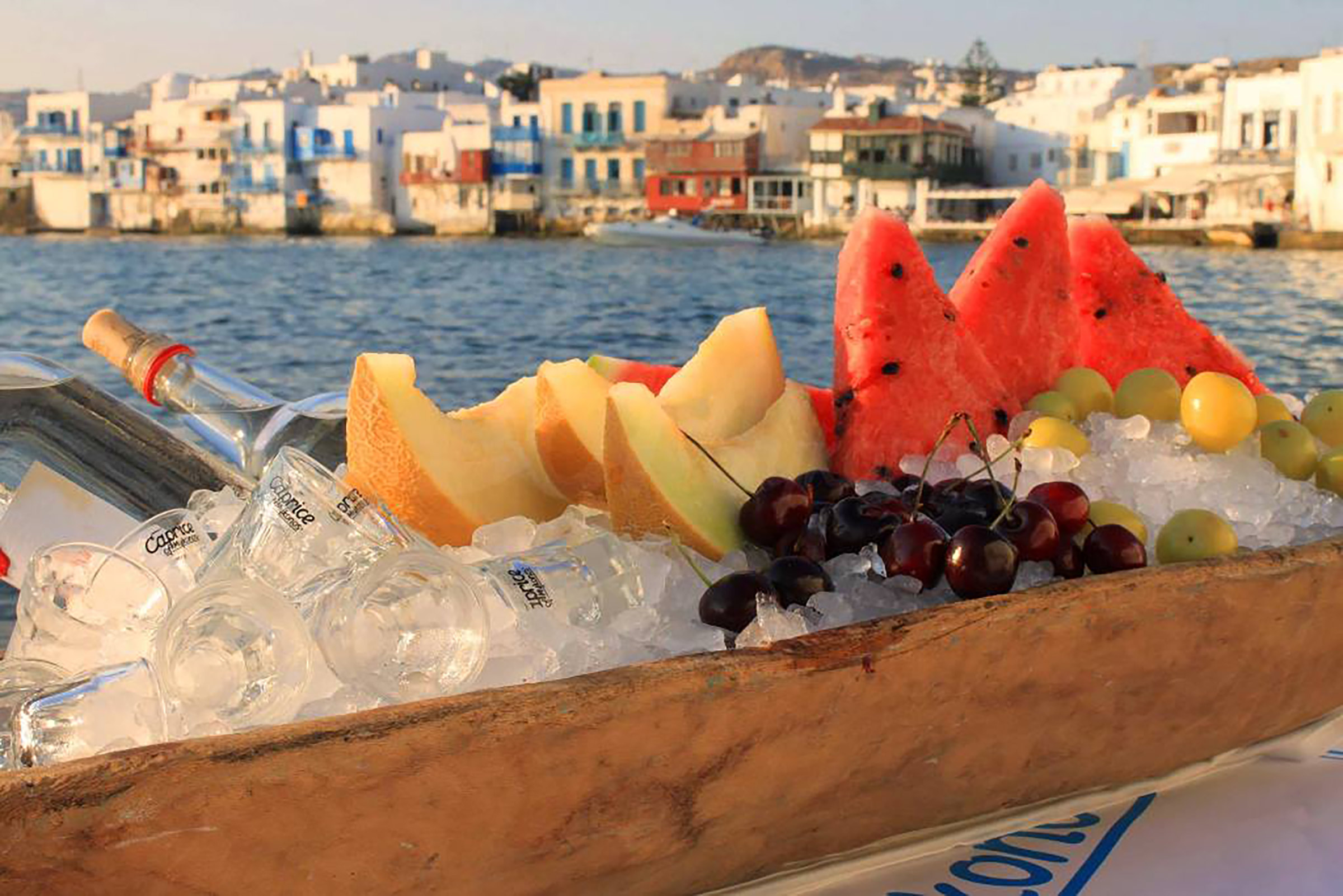 Its history dates back many decades and everyone who is anyone has found himself drinking, dancing, flirting and partying in this iconic place, where from sunset until morning is where the actual heart of the island is beating. Everyone has a story to share from here…some stories have a sunset background, some others a wild party scene, and most a mega-celebrity partying just a few feet away. - Secondary Image