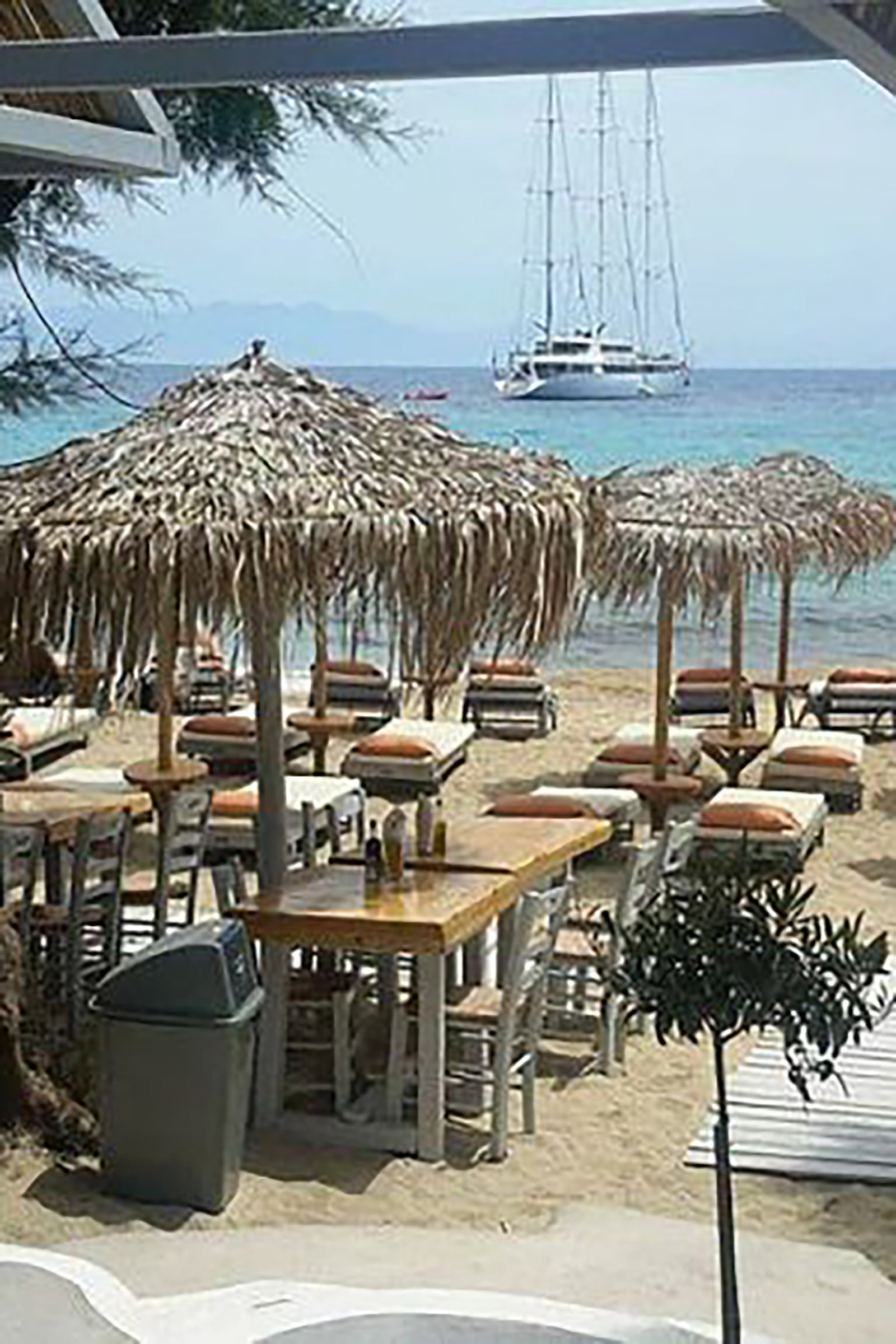 On the far-left end of the lively Paraga beach the traditional taverna of Tasos has been standing there since 1962 and can proudly declare to constitute an “alive and kicking” piece of Mykonian history, as some of the greatest celebrities of the old and new Mykonos era have been seated at its solid wooden tables, treasuring the breezy Greek summer days. - Image