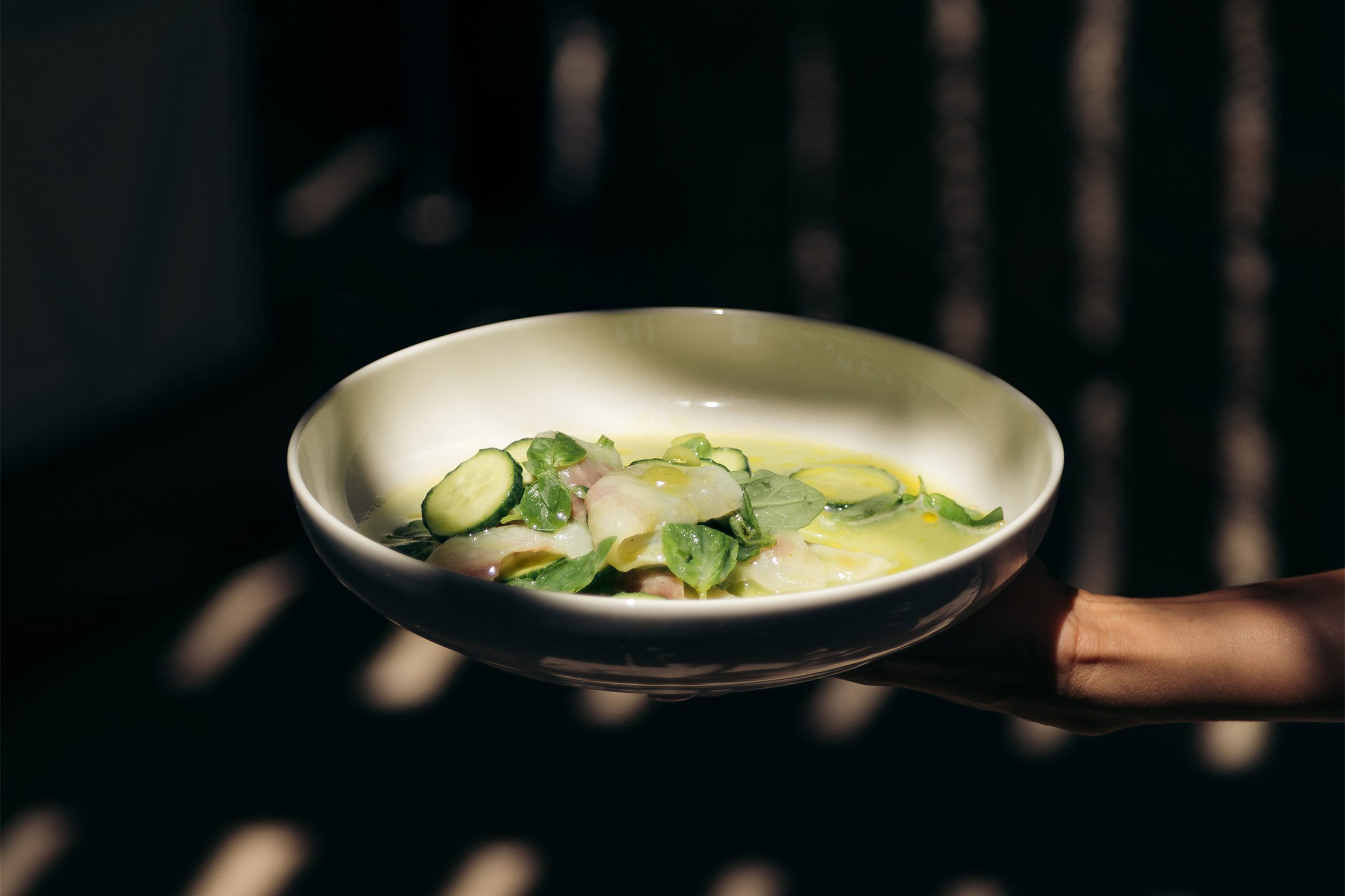 IT Mykonos features a creative Mediterranean menu designed by the two Michelin-starred chef Nino Di Costanzo. - Secondary Image