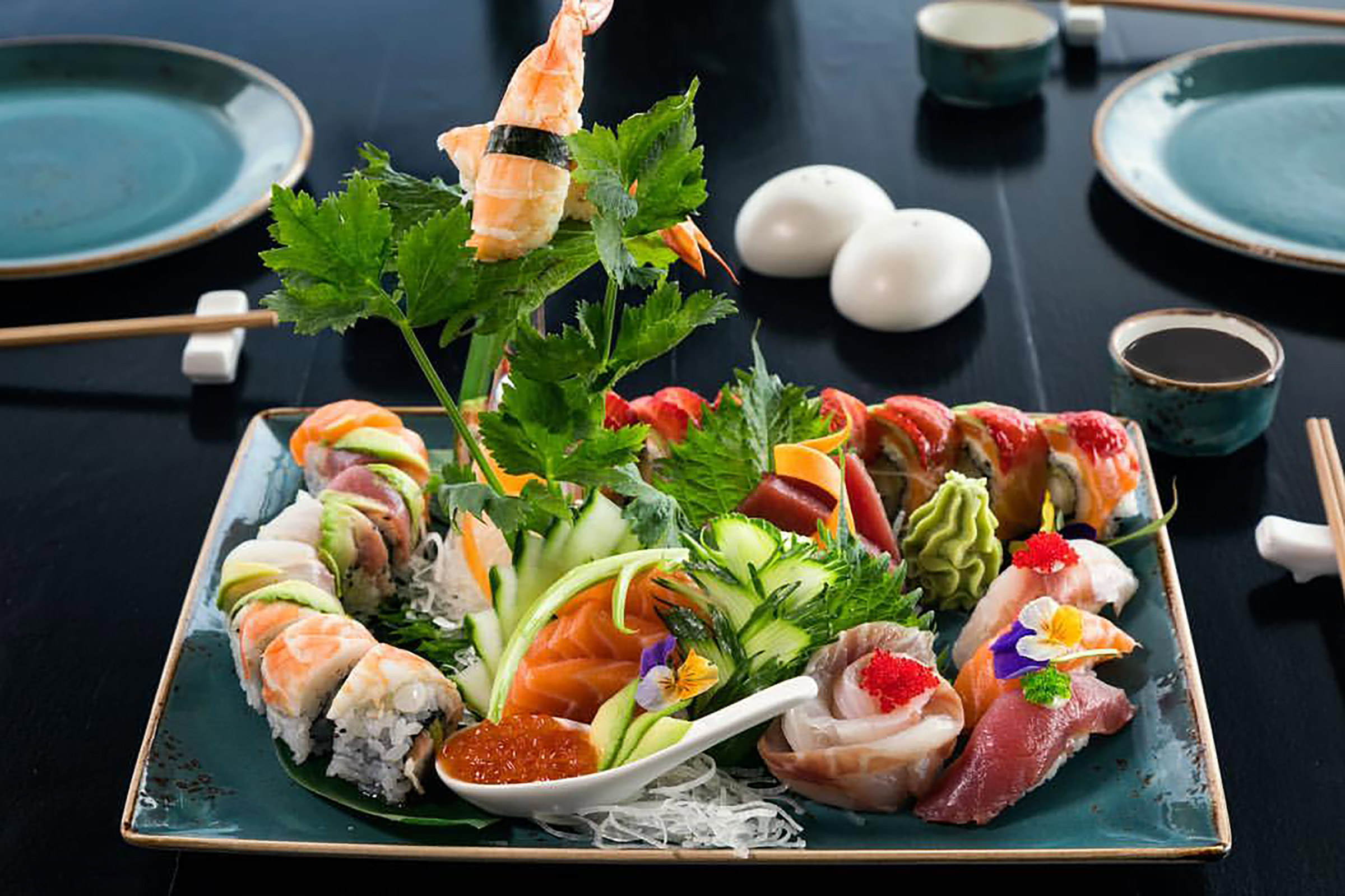 Enjoy the celebrated Buddha-Bar specialties, alongside with exciting fusion dishes with a Greek & Mediterranean twist, which use the best of local produce from the Cycladic land and sea. - Secondary Image