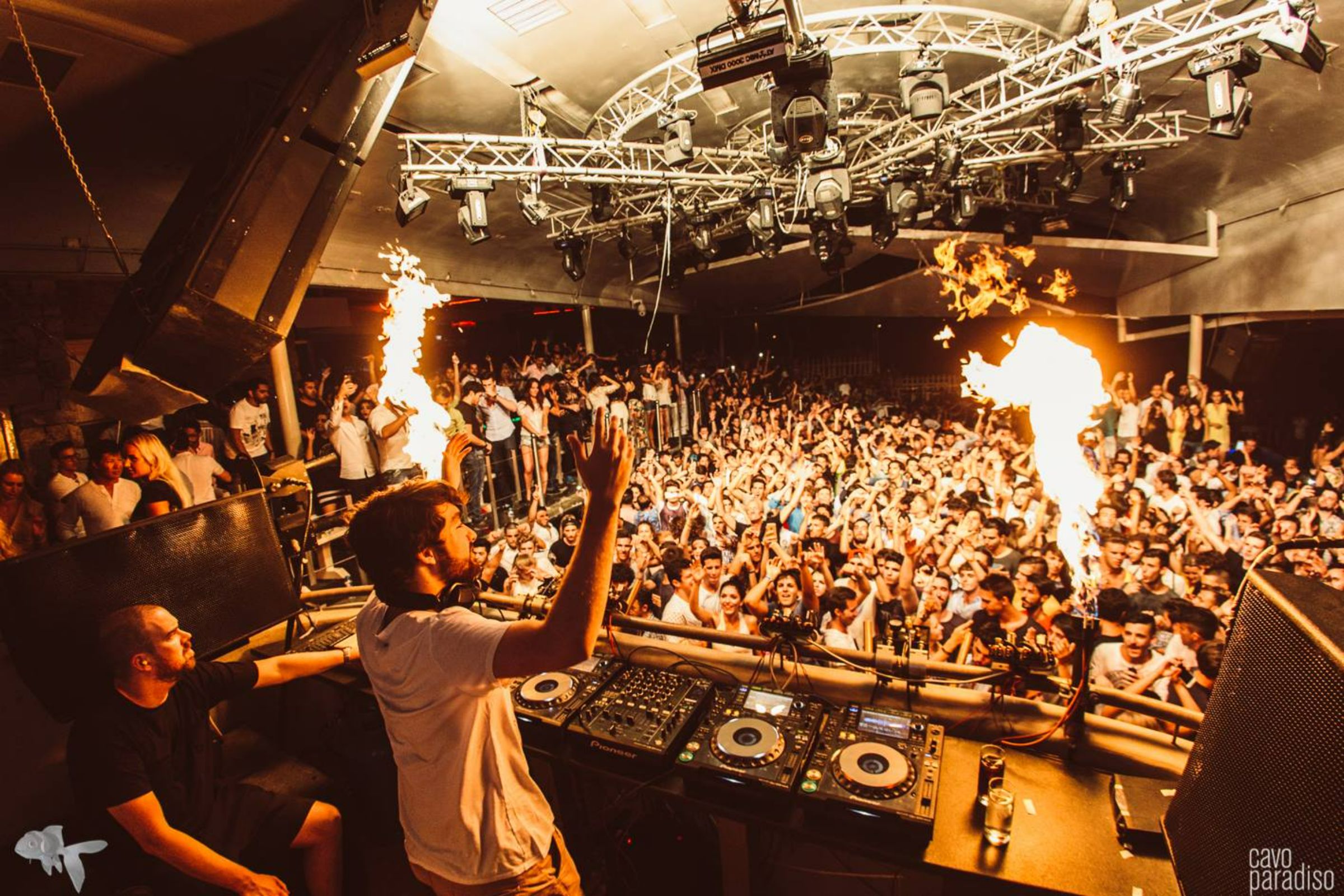 Cavo Paradiso has surely played a significant part in Mykonos being established as a vibrant summer resort for wild party-seekers around the globe. Everyone from Frankie Knuckles to Ricardo Vilalobos have graced its booth, with sworn clubbing enthusiasts dancing wildly around its gorgeous terrace swimming pool. The party vibe here is unrivalled and the setting is so amazing that you may catch yourself wandering off to the far end and just gazing at the sun rising from the sea. - Secondary Image