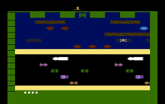 Animated gif of Frogger on Atari 2600 from archive.org. Shows road with cars and trucks driving by and a river with logs and turtles floating by. In between are two yellow sidewalks.