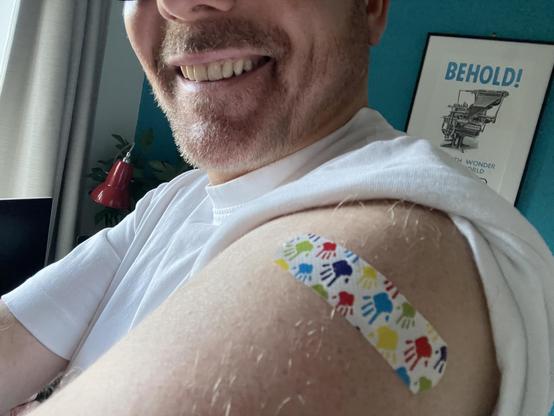 Close-up of the kid’s plaster on my arm.