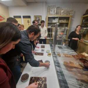 Chocolate disc decorating as part of BPO’s Christmas team-building program.