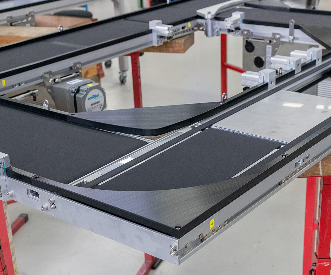 Transfersystem mit Ein- und Doppelgurt