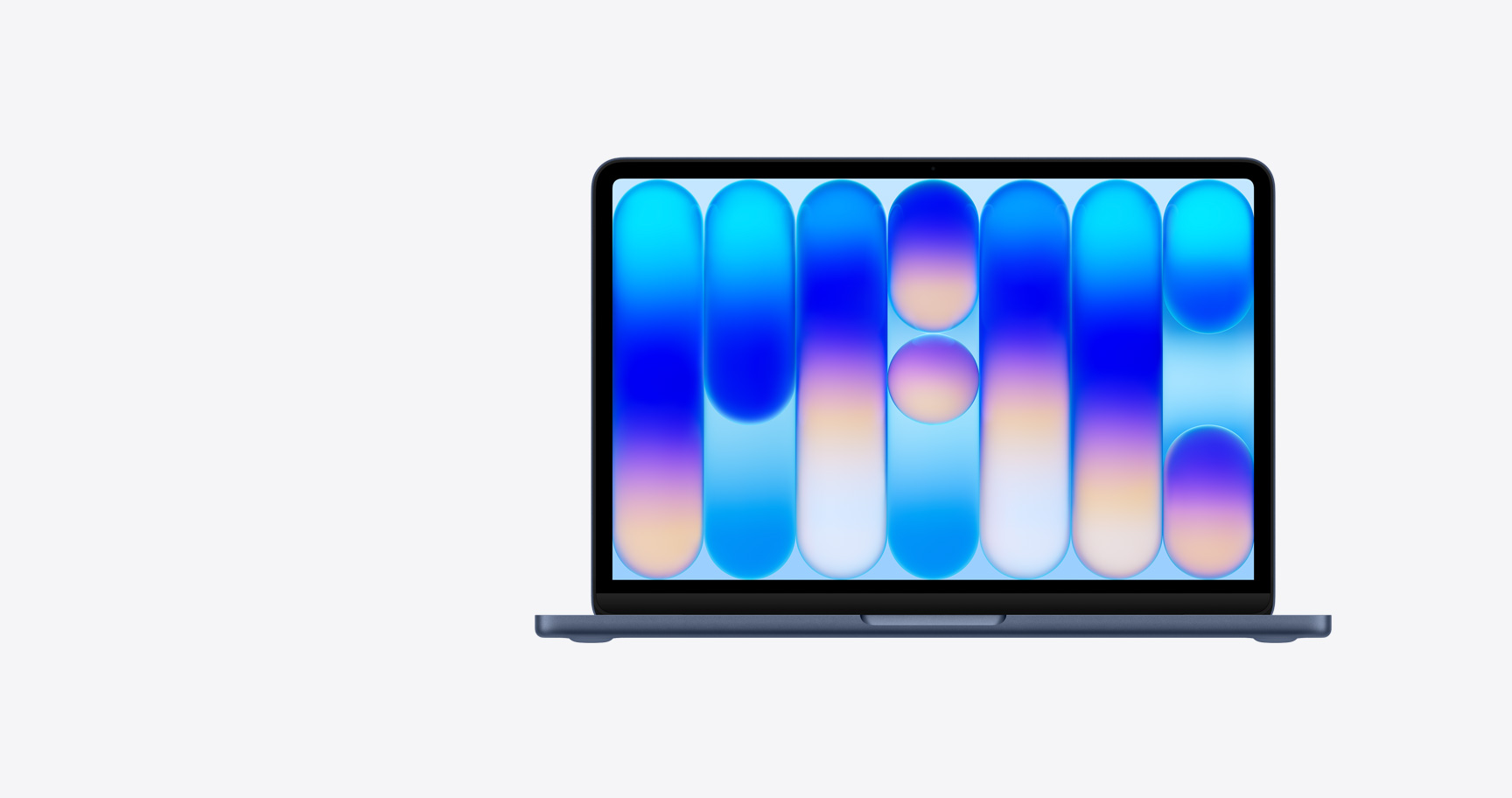 MacBook Neo, otvorený, indigová farba, farebná abstraktná tapeta