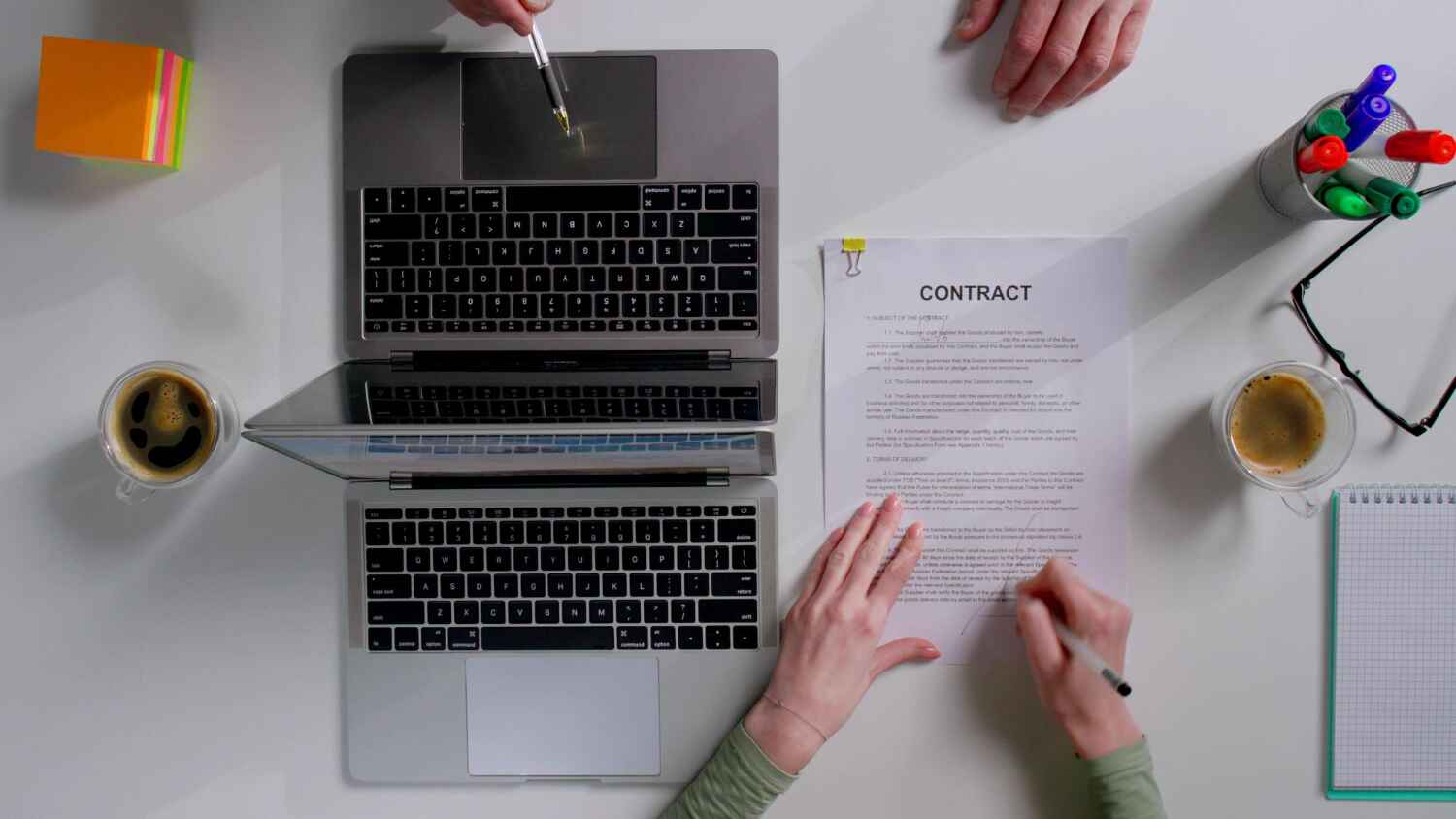 Reviewing a freelance contract before signing an agreement