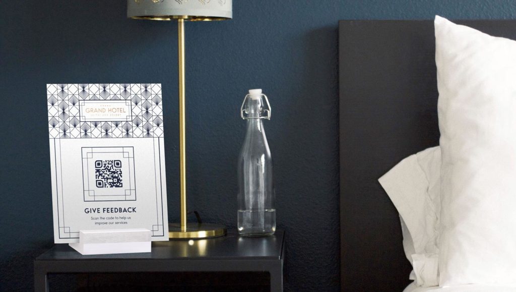 Example of a Feedback QR Code on a table tent in a hotel room