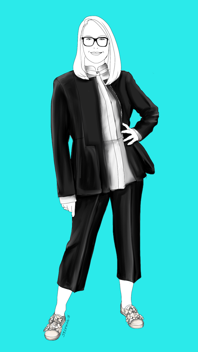 Zu dem puristischen, schwarz-weißen Business-Outfit mit schmaler Culotte und Schößchen-Blazer passen die Blüten-Slip-ons als Stilbruch. So kommt ein bisschen feminine Romantik und Lässigkeit in den Look.
