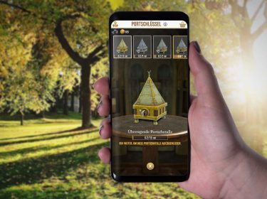 Am Smartphone in Harry Potter: Wizards Unite eine Portschatulle ansehen.
