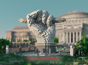 Denkmal einer Faust mit Füller in der Hand vor der Minecraft-Bibliothek