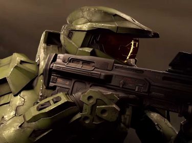 Master Chief zielt mit einer Waffe in Halo
