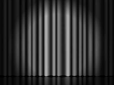 Auf dem Bild zu den Samsung-Neuheiten ist ein geschlossener, schwarzer Vorhang zu sehen, der durch gezielte Lichtakzente in der Mitte dramatisch hervorgehoben wird. Die Szene wirkt geheimnisvoll und erzeugt Spannung, als würde sich dahinter bald eine neue Produktpräsentation enthüllen. Ideal als Symbolbild für kommende Samsung-Neuheiten.