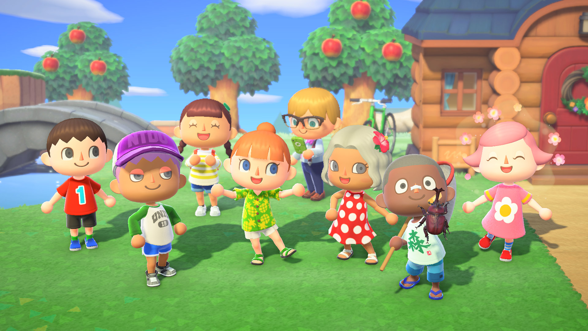 Das Bild zeigt verschiedene Spielercharaktere aus Animal Crossing: New Horizons, die gut gelaunt auf einer grünen Wiese posieren. Im Hintergrund stehen Apfelbäume, ein Holzhaus und eine Steinbrücke. Die Vielfalt und Individualität der Figuren betonen den kreativen Spielansatz von Animal Crossing für die Switch 2.