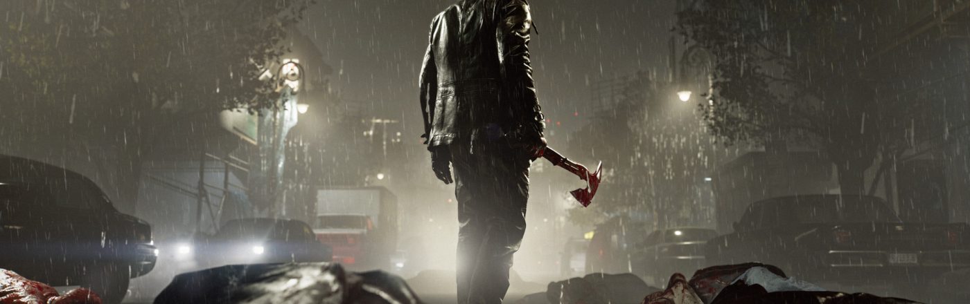 Leon S. Kennedy steht im Dunkeln auf einer Straße. Um ihn herum liegen erledigte Untote, er hält eine Axt in der Hand.