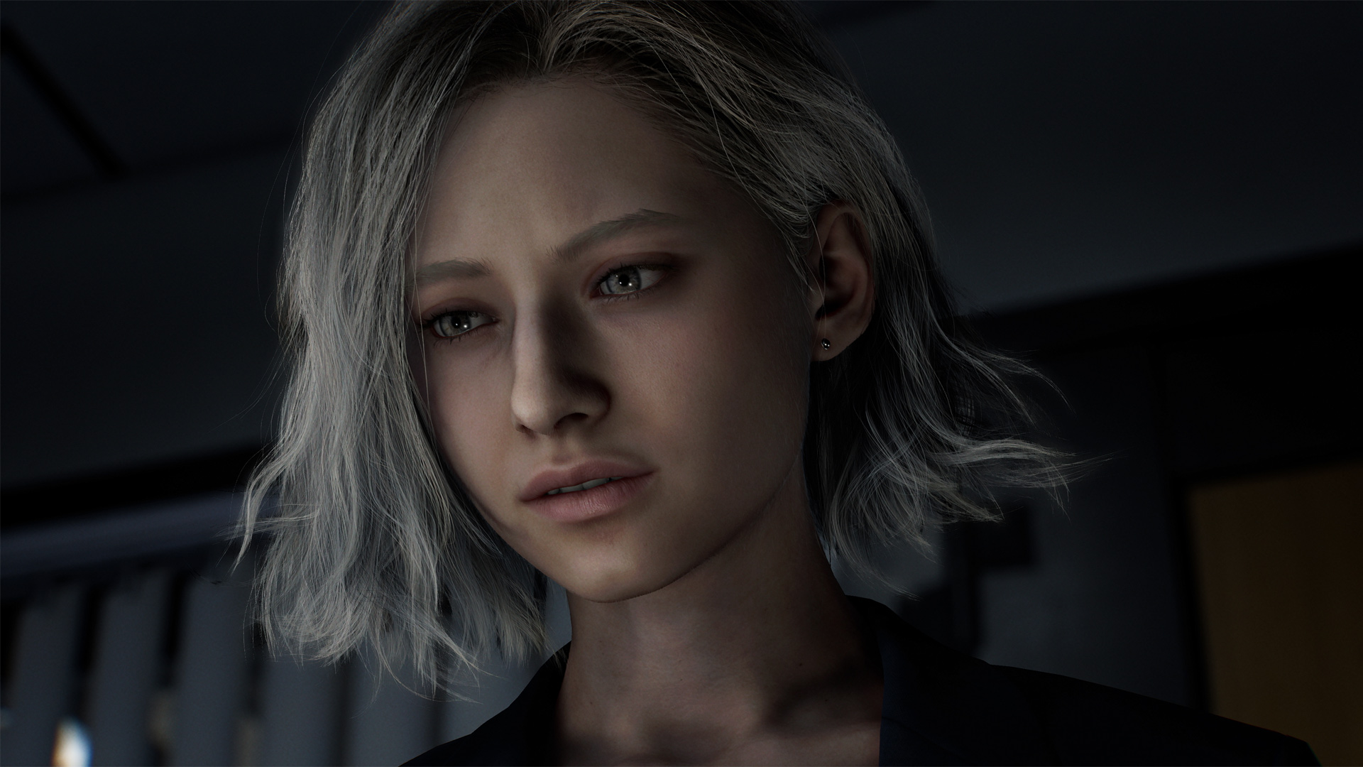 Auf dem Bild ist Grace Ashcroft aus dem Spiel zu sehen, eine der Resident Evil Requiem Charaktere. Sie hat silberblondes, schulterlanges Haar und einen nachdenklichen, leicht besorgten Gesichtsausdruck. Die Szene ist dunkel und wirkt angespannt, vermutlich spielt sie in einem Büro oder Labor. Ihre realistische Darstellung unterstreicht den ernsten Ton des Spiels.