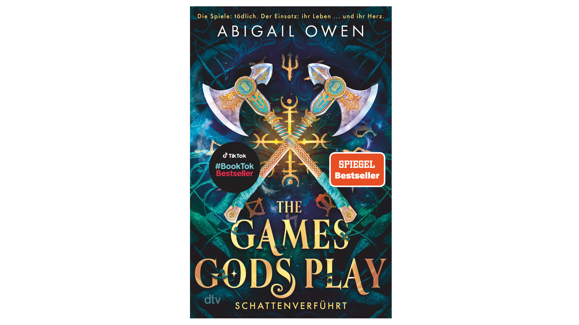 Das Cover von Band 1 der Buchreihe The Games Gods Play zeigt zwei gekreuzte Äxte mit goldenen Ornamenten vor einem mystischen, dunkelblauen Hintergrund mit Symbolen. Oben steht der Name der Autorin Abigail Owen, unten der Titel Schattenverführt. Das Buch ist als SPIEGEL Bestseller ausgezeichnet. Ideal zur Darstellung der The Games Gods Play-Reihenfolge.