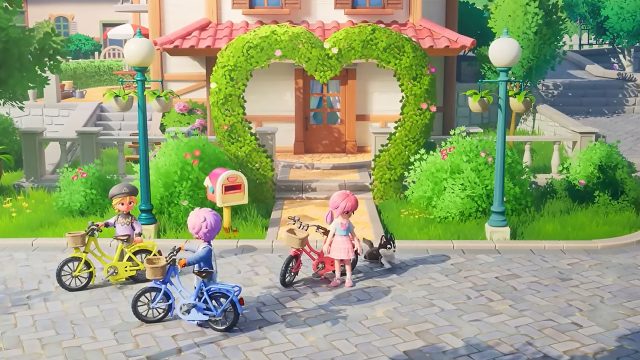 Drei Spielende vor einem Haus in „Heartopia“.