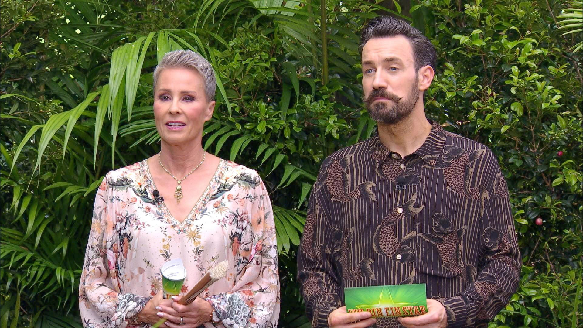 Auf dem Bild in dem Artikel zum Dschungelcamp 2026 sind Sonja und Jan an Tag 3 zu sehen.