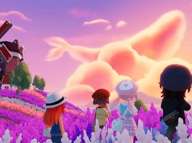 Mehrere Spielende betrachten einen Sonnenuntergang in „Heartopia“.