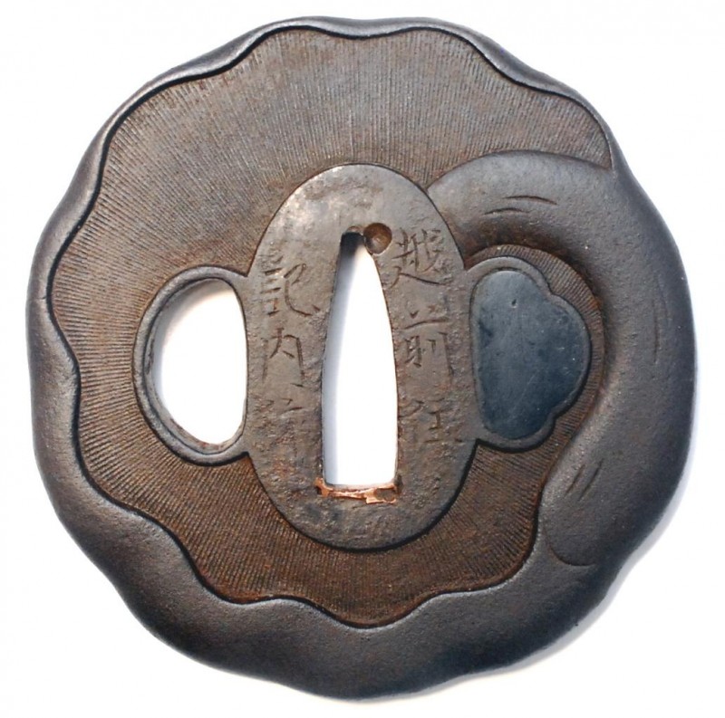 Edo period signed Kinai tsuba. Musroom carved design. Signed: ECHIZEN JU/KINAI SAKU.
If you have ...